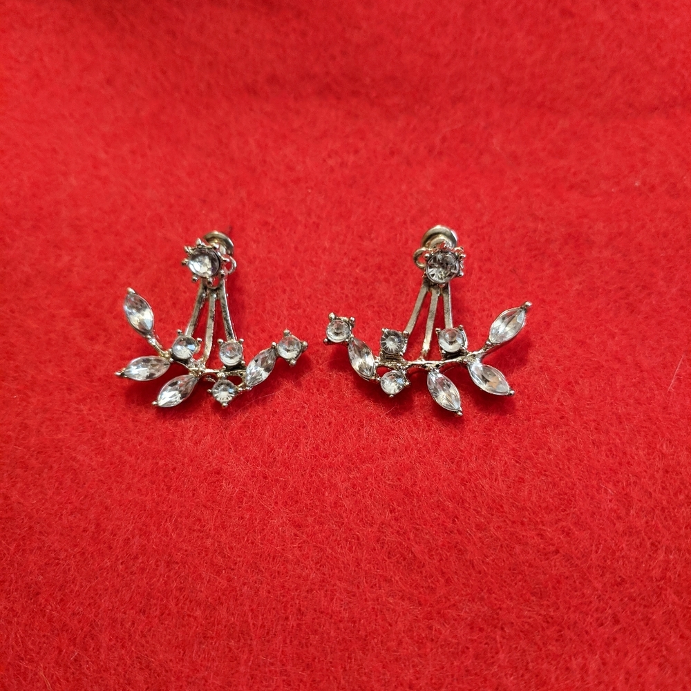Women's pierced beautiful silver tone crystal earrings